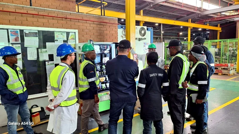 PPE dispenser training on the factory floor